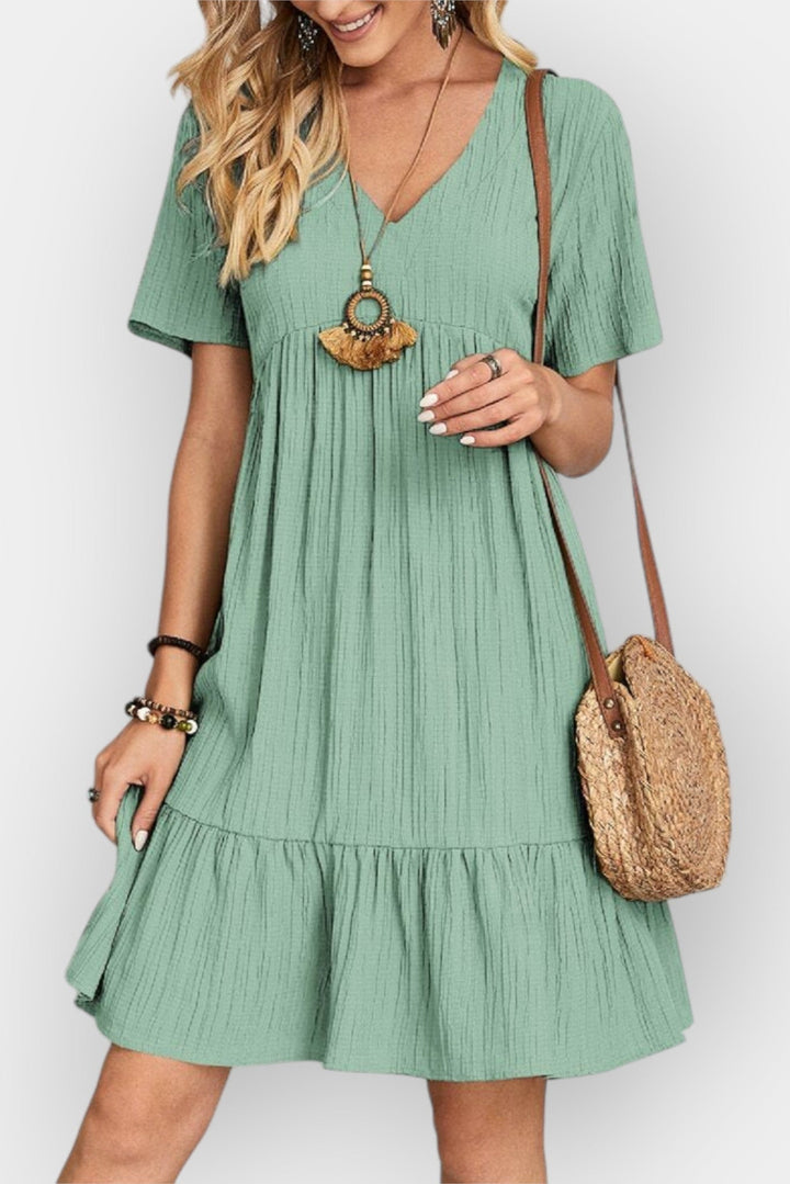 Kostkované šaty s V výstřihem