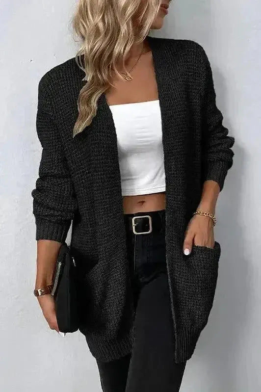 Růžový otevřený svetr